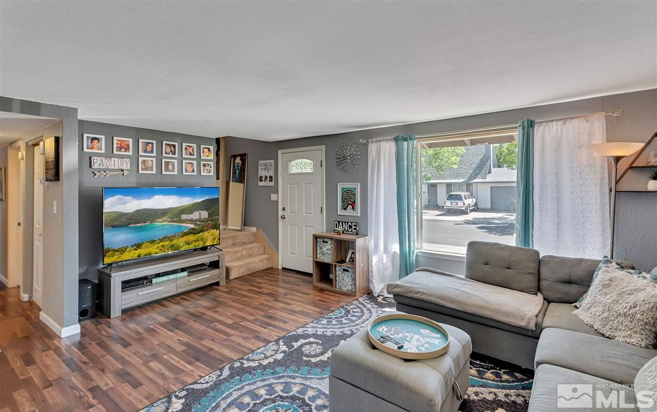 32 Gault Way Sparks, NV 89431 - Photo 5 of 26 a living room with furniture and a flat screen tv
