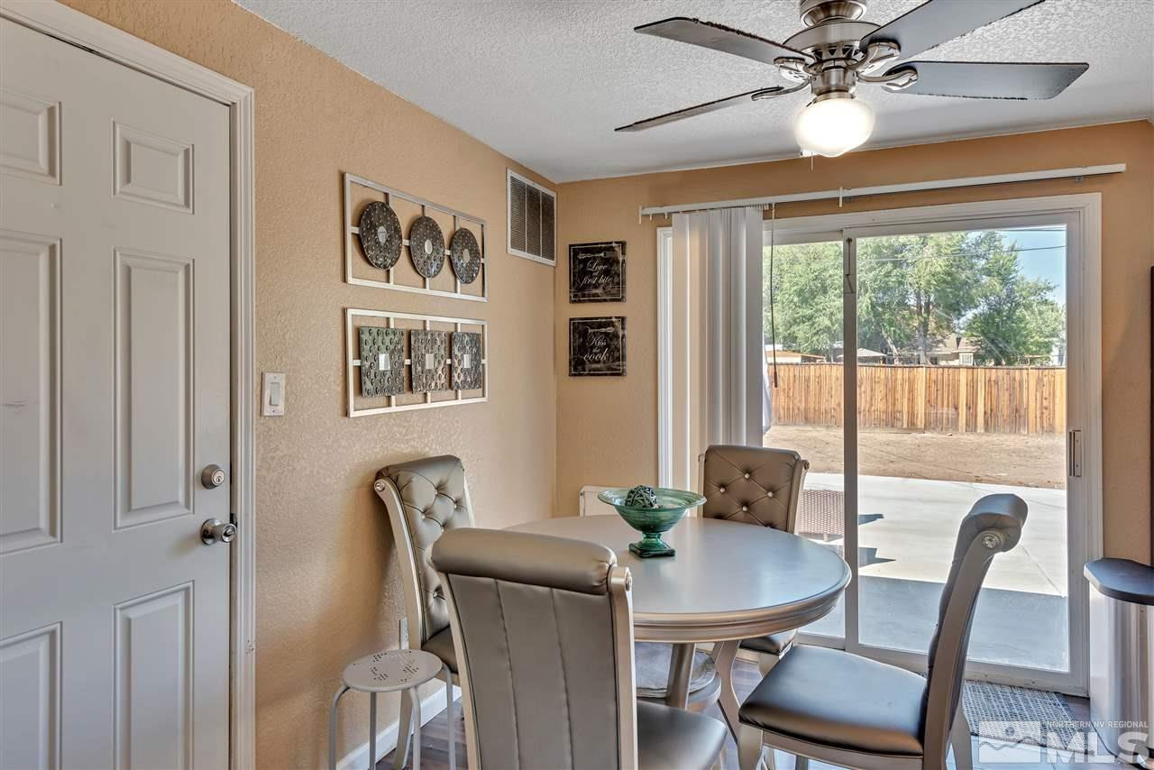 32 Gault Way Sparks, NV 89431 - Photo 7 of 26 a view of a dining room with furniture window and outside view