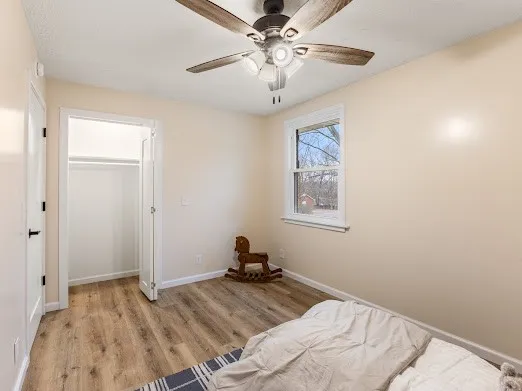 a workspace with furniture and wooden floor