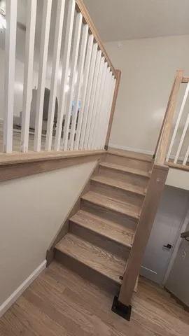 a stove top oven sitting inside of a kitchen
