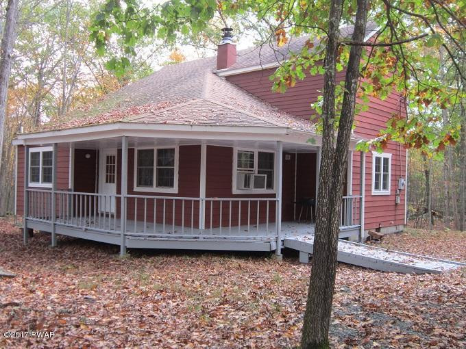 245 Eagle Rock Road Lackawaxen, PA 18435 - Photo 1 of 4 a view of a house with a small deck