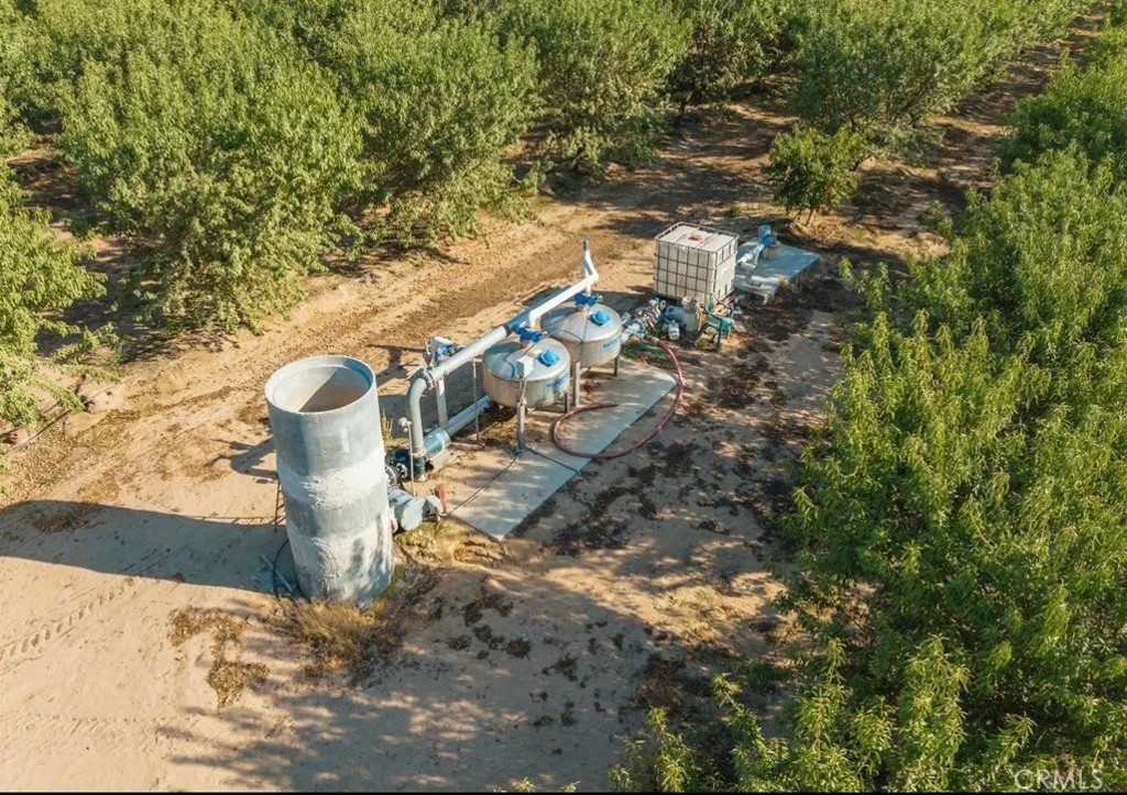 1 Longview Avenue Livingston, CA 95334 - Photo 4 of 5 a view of a fire pit with large trees
