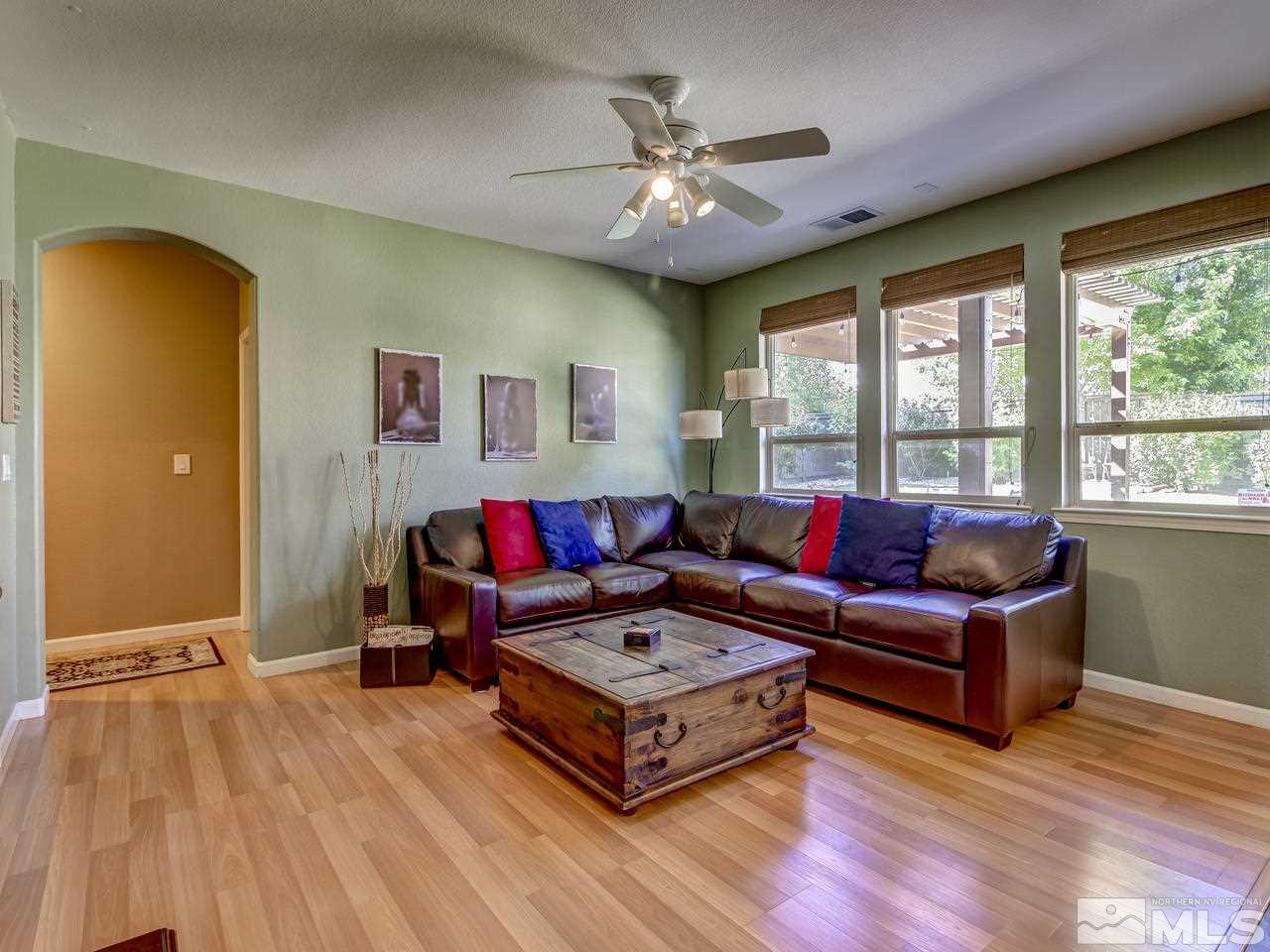 570 Magistrate Court Reno, NV 89521 - Photo 3 of 25 a living room with furniture and a large window