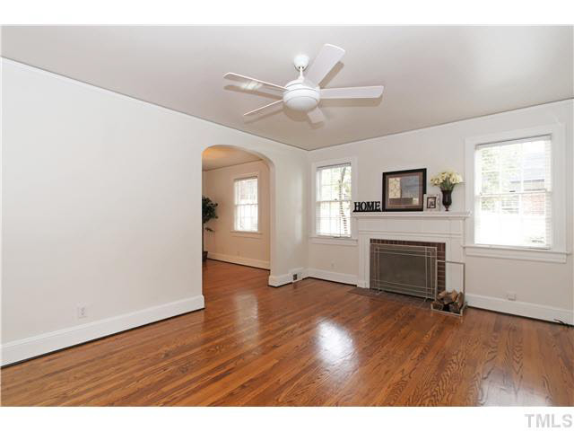 517 Gardner Street Raleigh, NC 27607 - Photo 3 of 21 All of the hardwoods have been recently refinished. The gas fireplace is centrally located with brick hearth & surround. The entire home has a fantastic trim package on all windows and 5" base trim. Enjoy smooth ceilings & ceiling fan!