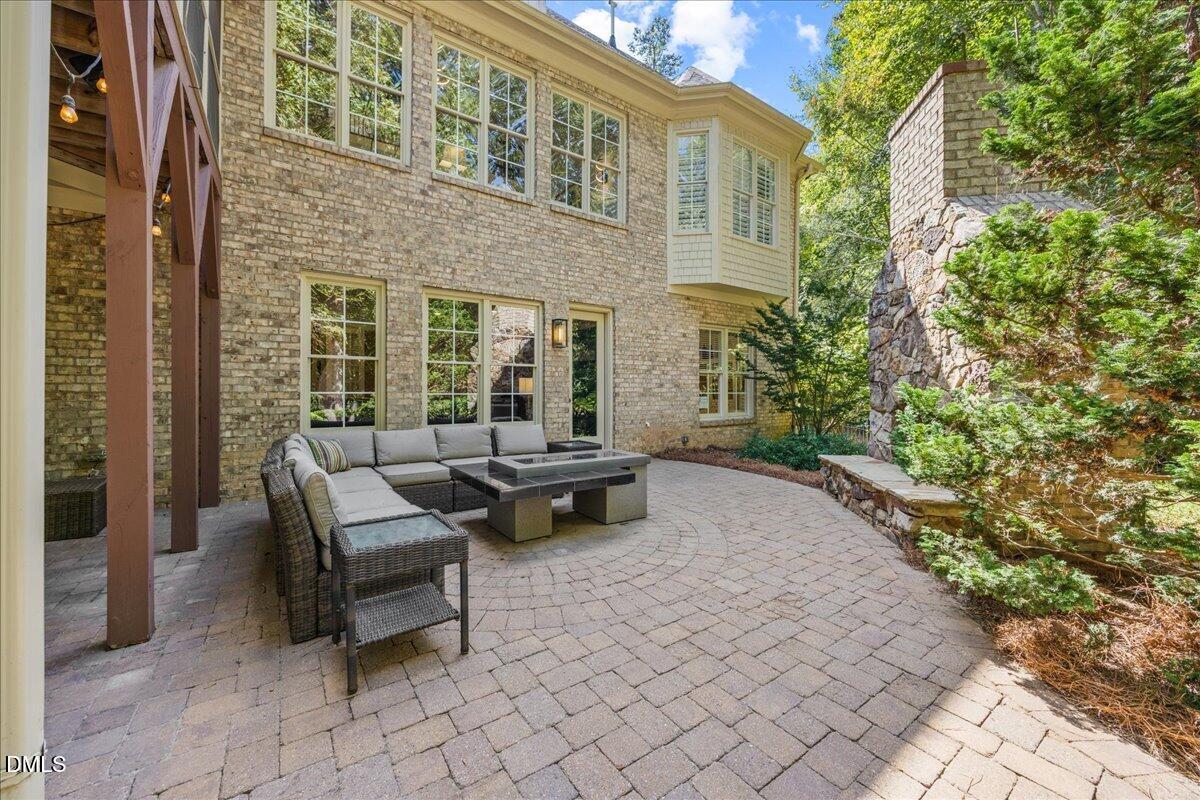 1504 Consett Court Raleigh, NC 27613 - Photo 61 of 81 Lower level stone patio