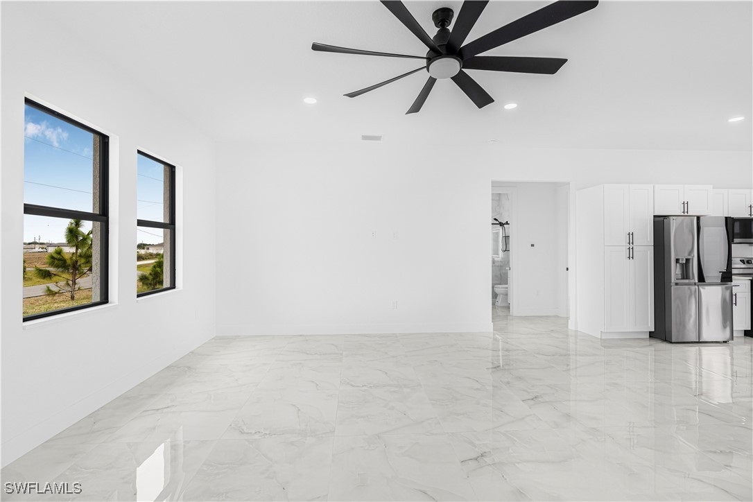 9007 East Crow Circle LaBelle, FL 33935 - Photo 18 of 46 an empty room with closet and a ceiling fan