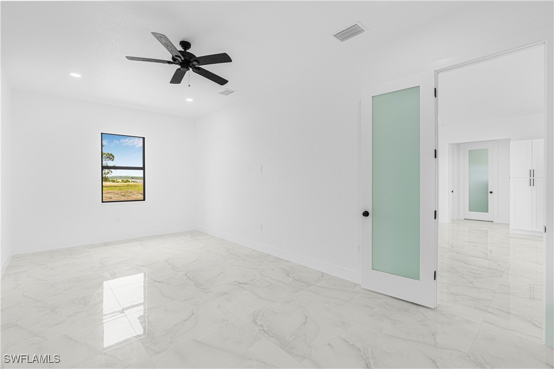 9007 East Crow Circle LaBelle, FL 33935 - Photo 26 of 46 a view of a hallway with a window
