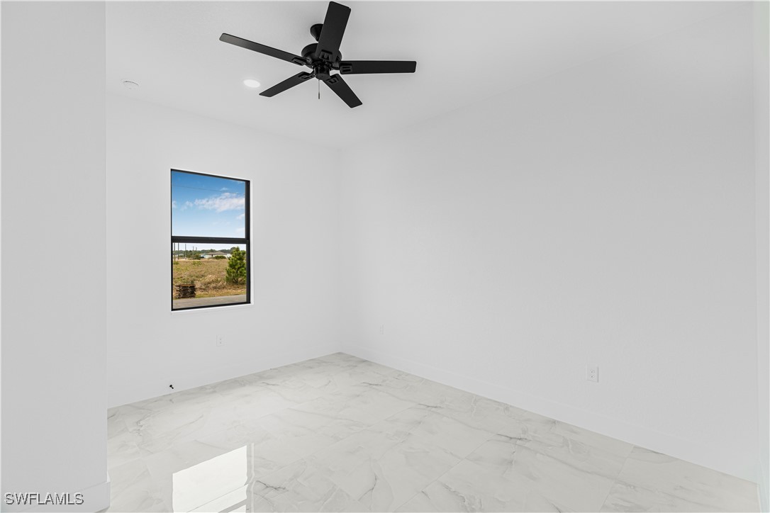 9007 East Crow Circle LaBelle, FL 33935 - Photo 33 of 46 a view of a hallway with a window