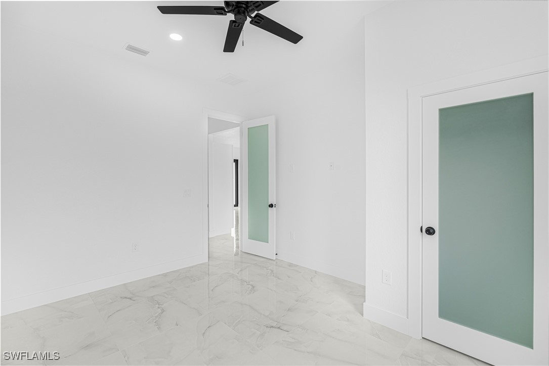 9007 East Crow Circle LaBelle, FL 33935 - Photo 34 of 46 a view of a room with a ceiling fan