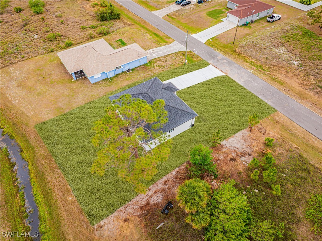 9007 East Crow Circle LaBelle, FL 33935 - Photo 41 of 46 a view of a swimming pool and an outdoor space
