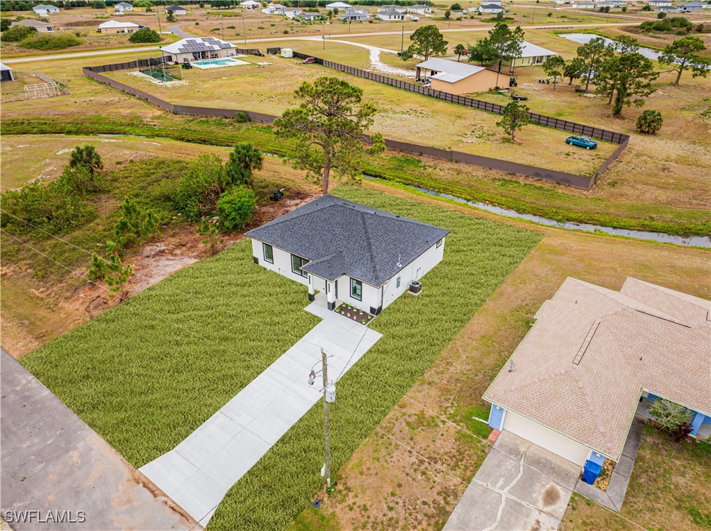 9007 East Crow Circle LaBelle, FL 33935 - Photo 6 of 46 an aerial view of residential houses with outdoor space