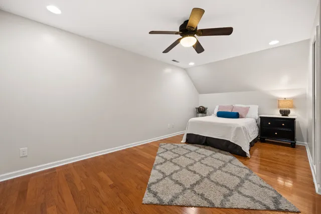 a living room with lots of furniture and flat screen tv