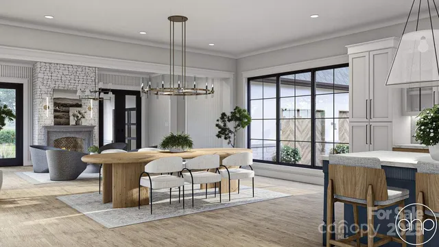 a large kitchen with a table and chairs