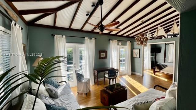 27316 Cayman Lane, Unit A Lower Keys, FL 33042 - Photo 15 of 47 a living room with furniture and wooden floor