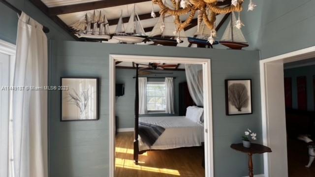 27316 Cayman Lane, Unit A Lower Keys, FL 33042 - Photo 16 of 47 a hallway with white walls and wooden floor