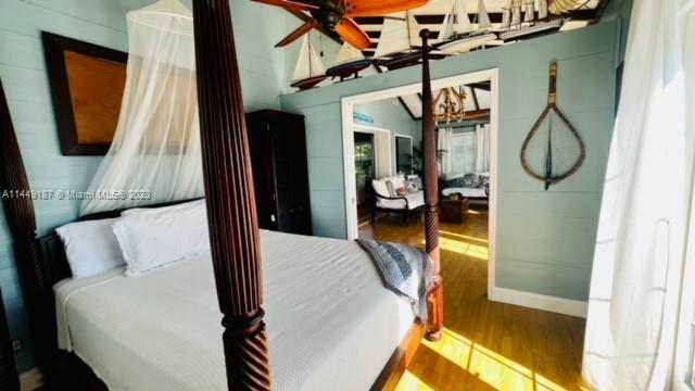 27316 Cayman Lane, Unit A Lower Keys, FL 33042 - Photo 18 of 47 a living room with furniture and a flat screen tv