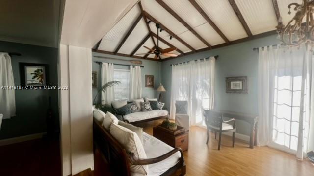 27316 Cayman Lane, Unit A Lower Keys, FL 33042 - Photo 25 of 47 a view of a livingroom with furniture window and wooden floor