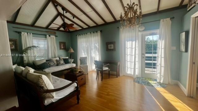 27316 Cayman Lane, Unit A Lower Keys, FL 33042 - Photo 26 of 47 a living room with furniture and a large window