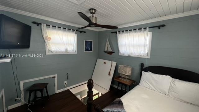 27316 Cayman Lane, Unit A Lower Keys, FL 33042 - Photo 35 of 47 a room with furniture and a window