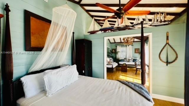 27316 Cayman Lane, Unit A Lower Keys, FL 33042 - Photo 38 of 47 a bedroom with a bed and walk in closet