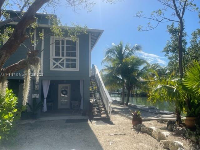 27316 Cayman Lane, Unit A Lower Keys, FL 33042 - Photo 46 of 47 a front view of a house