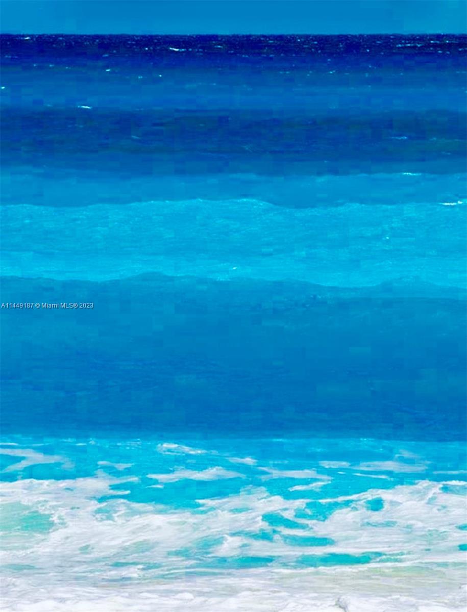 27316 Cayman Lane, Unit A Lower Keys, FL 33042 - Photo 47 of 47 a view of empty room with wooden floor and fan