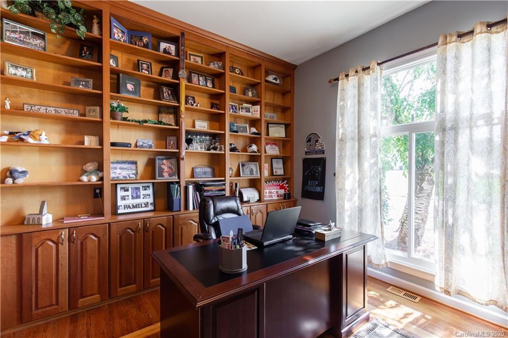 231 Pennington Road Rock Hill, SC 29732 - Photo 11 of 46 a view of a workspace with a bookshelf