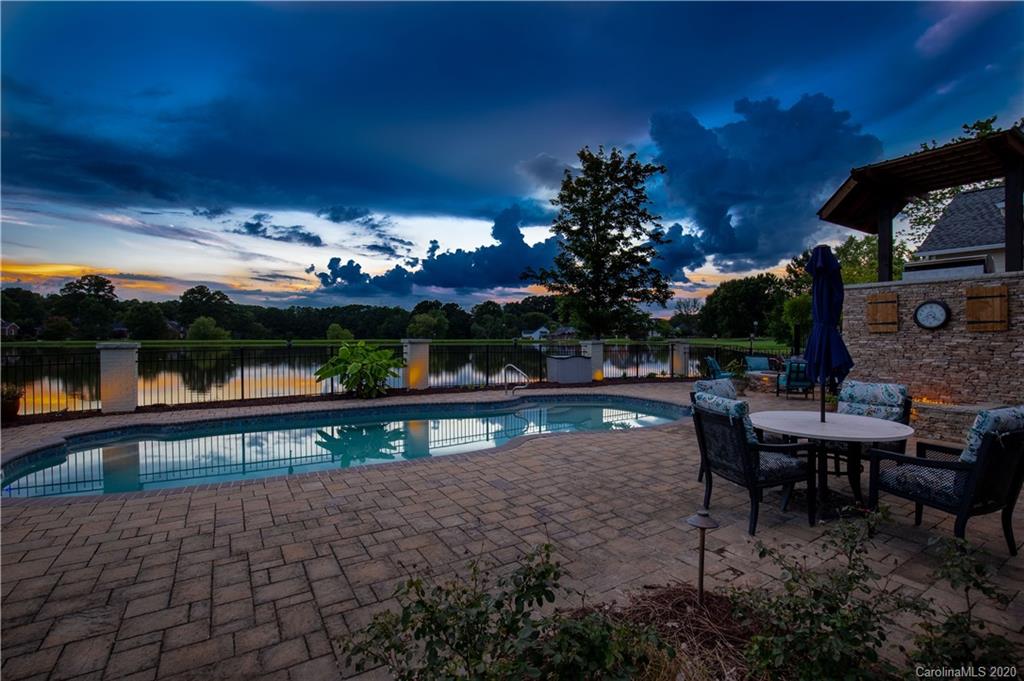 231 Pennington Road Rock Hill, SC 29732 - Photo 38 of 46 a view of a patio with swimming pool table and chairs