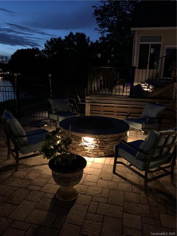 231 Pennington Road Rock Hill, SC 29732 - Photo 43 of 46 a view of a swimming pool with lawn chairs and a fire pit