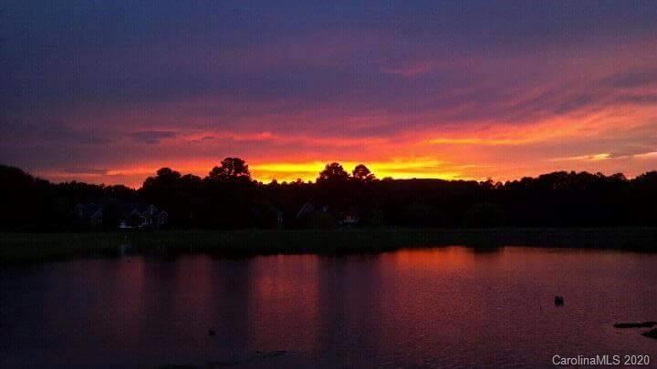 231 Pennington Road Rock Hill, SC 29732 - Photo 45 of 46 a sunset view with a lake