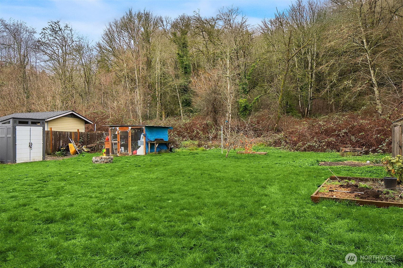 3404 Southeast 5th Street Renton, WA 98058 - Photo 15 of 24 a view of a house with backyard and garden
