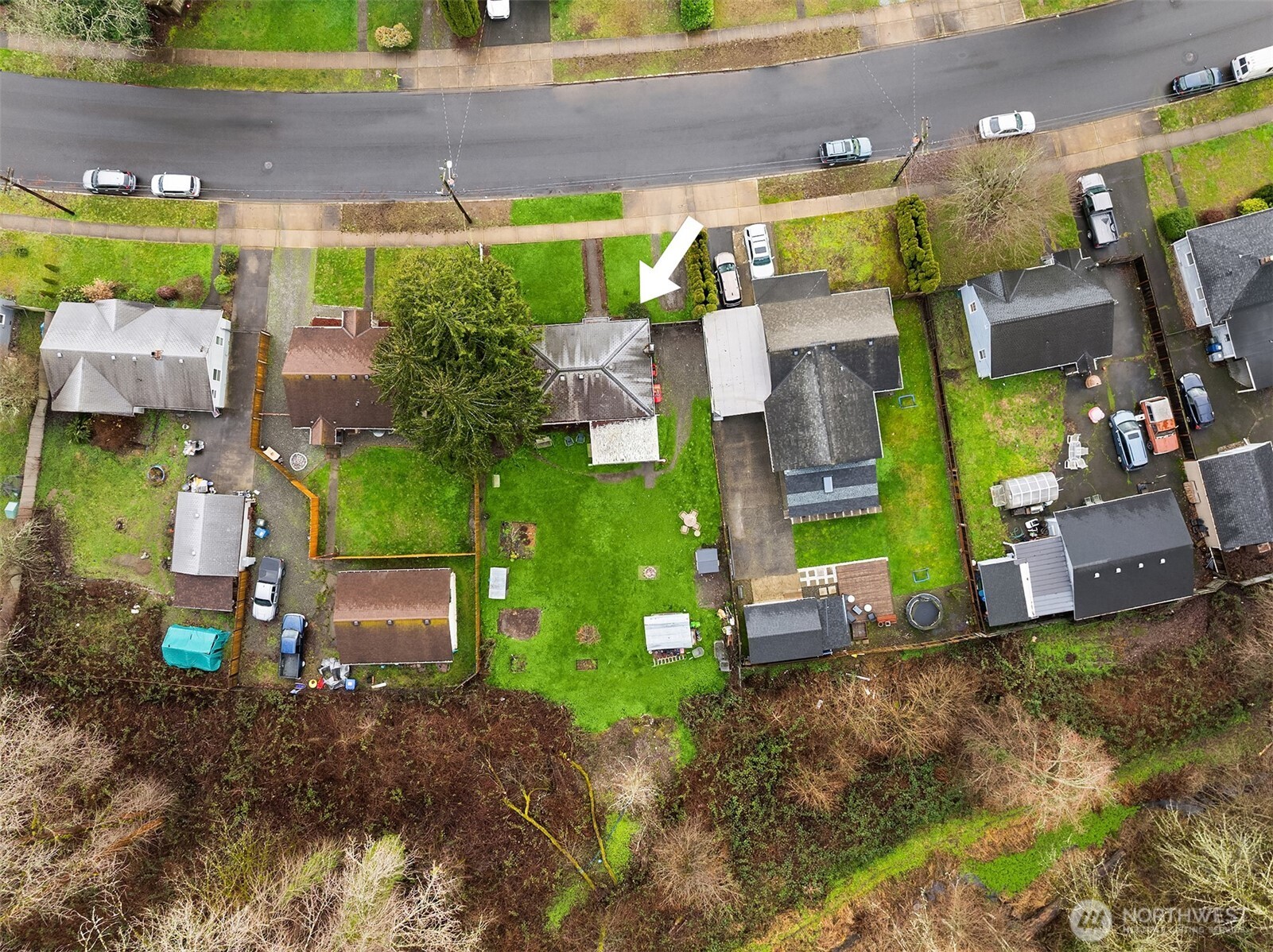 3404 Southeast 5th Street Renton, WA 98058 - Photo 2 of 24 a aerial view of a house with a yard and table and chairs