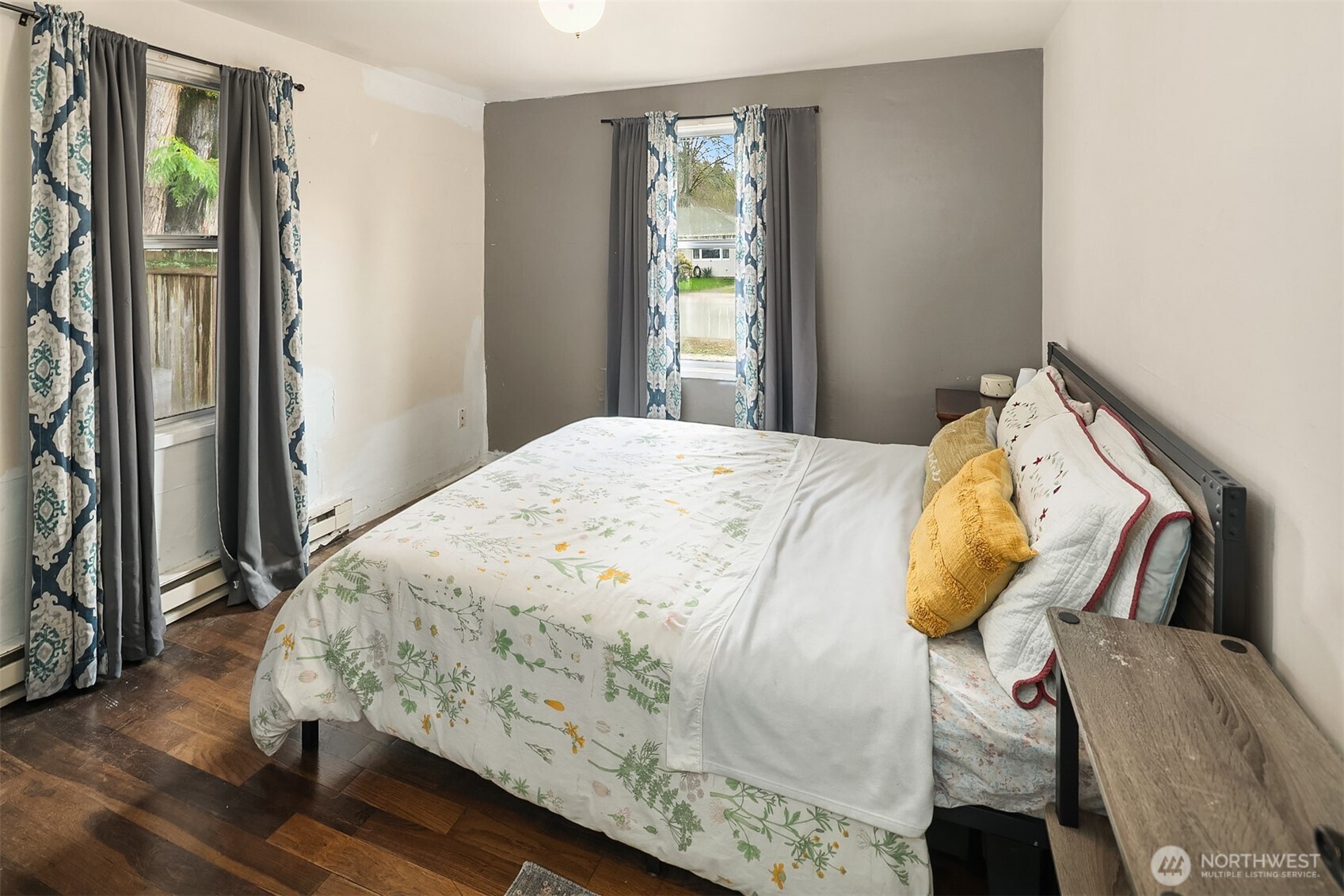 3404 Southeast 5th Street Renton, WA 98058 - Photo 8 of 24 a bedroom with a bed and wooden floor