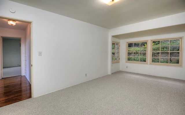 an empty room with windows