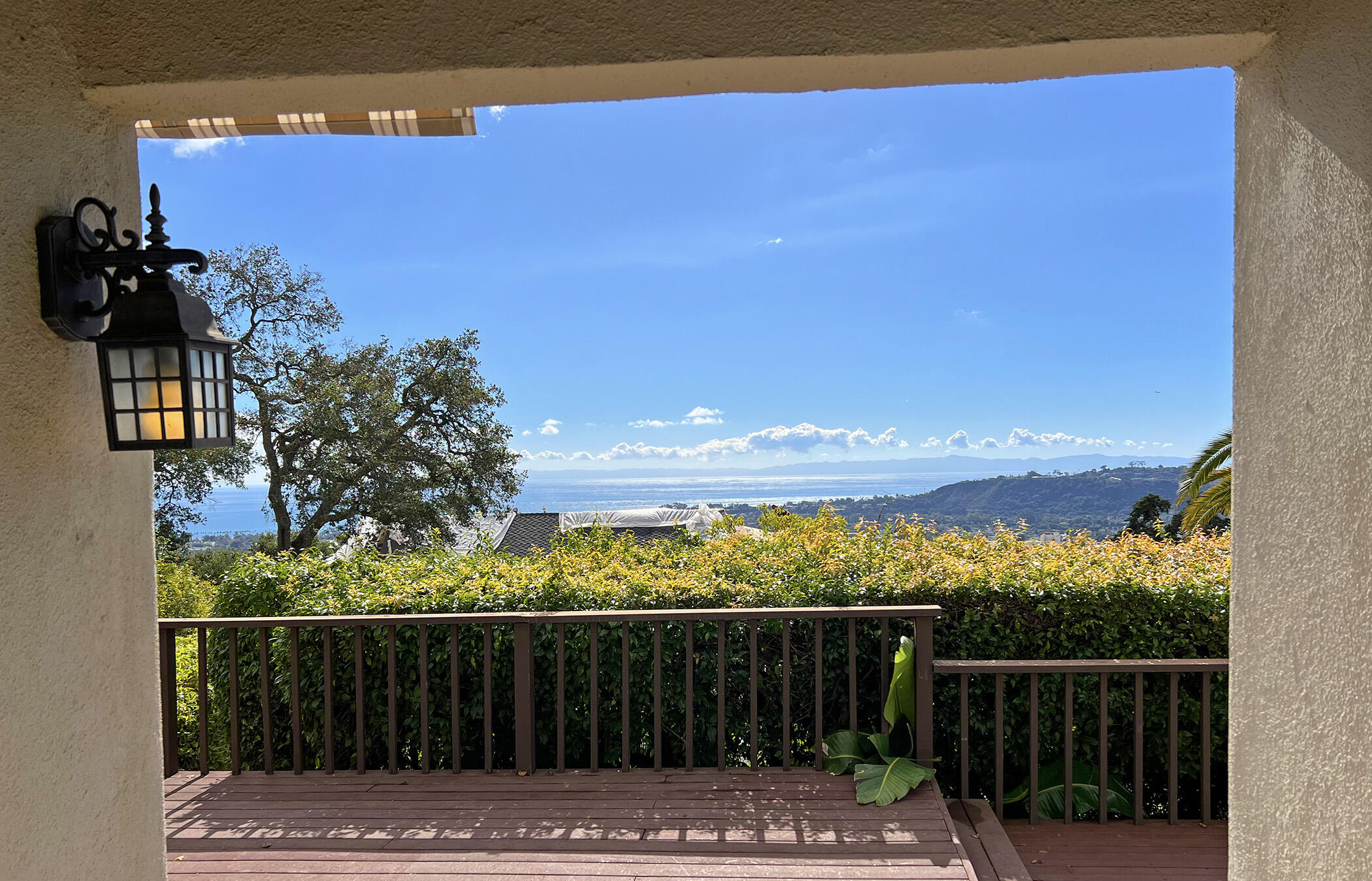 1712 Lasuen Road Santa Barbara, CA 93103 - Photo 32 of 38 a view of a yard with wooden fence