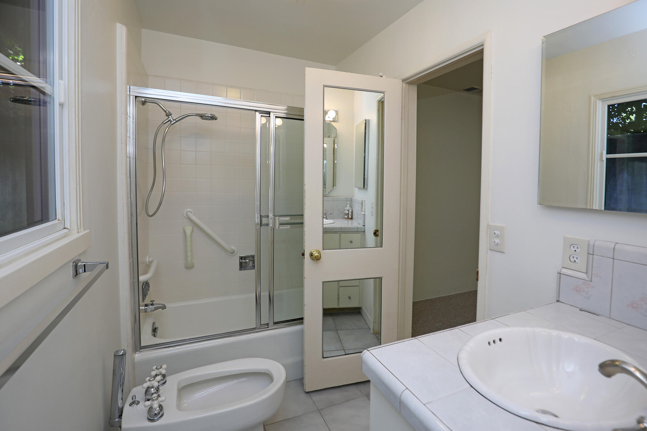 1712 Lasuen Road Santa Barbara, CA 93103 - Photo 38 of 38 a bathroom with a sink a toilet and shower