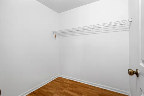 a view of a room with racks on the wall
