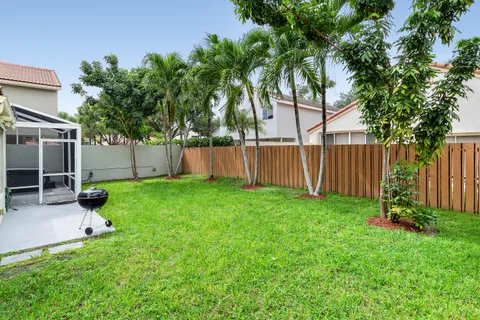 a view of a backyard with a garden