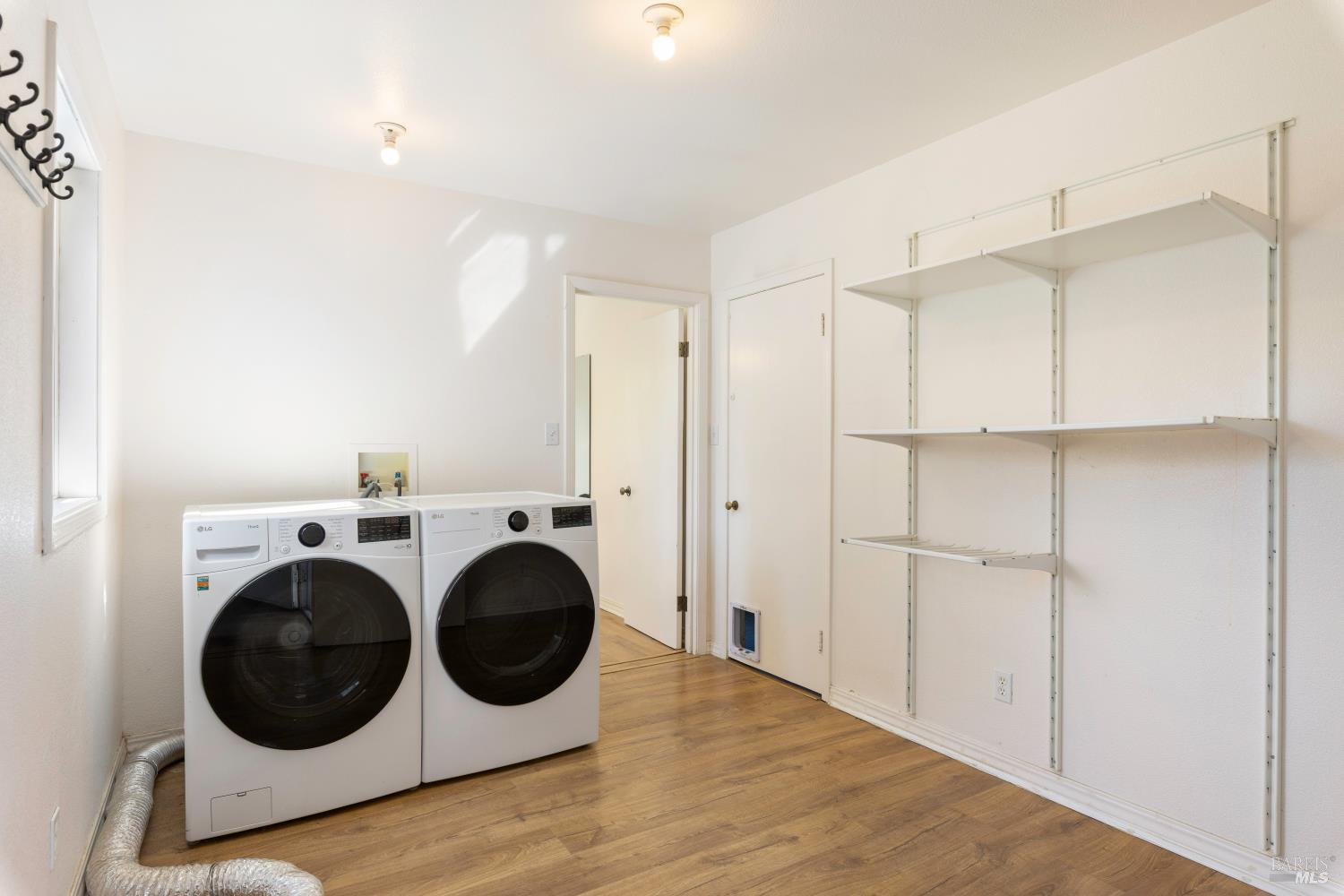 13780 Mountain House Road Hopland, CA 95449 - Photo 21 of 34 a view of a hallway with washer and dryer