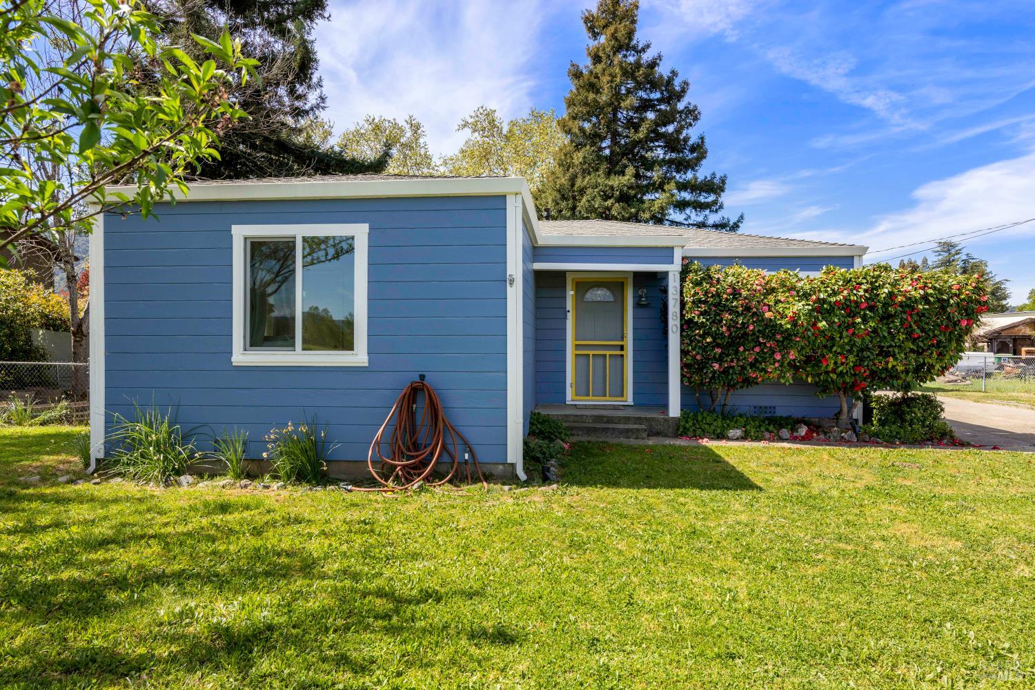 13780 Mountain House Road Hopland, CA 95449 - Photo 25 of 34 a view of a house with backyard porch and sitting area