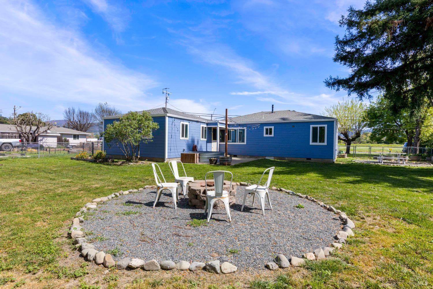 13780 Mountain House Road Hopland, CA 95449 - Photo 28 of 34 a view of a house with a yard porch and sitting area