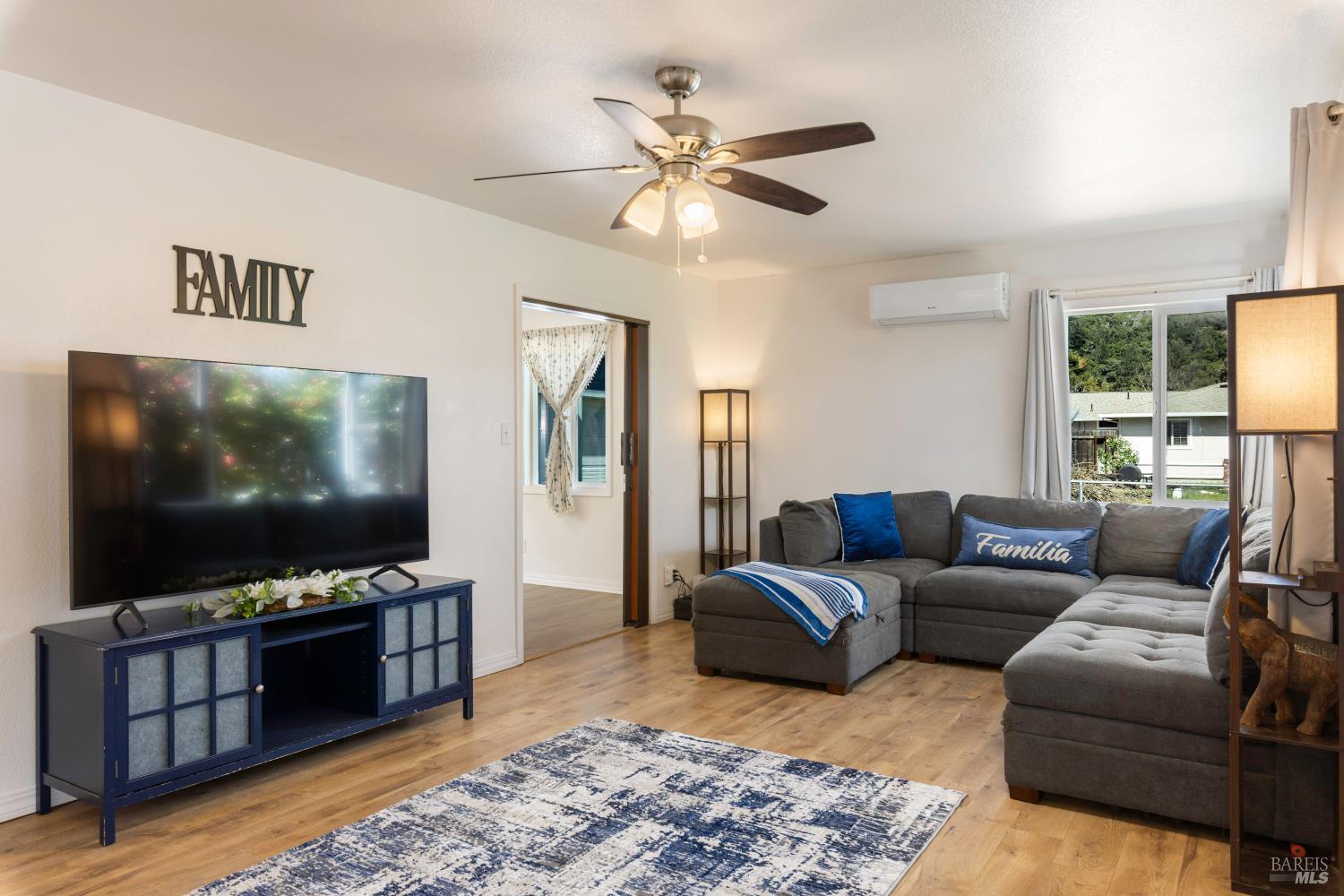 13780 Mountain House Road Hopland, CA 95449 - Photo 5 of 34 a living room with furniture and a flat screen tv