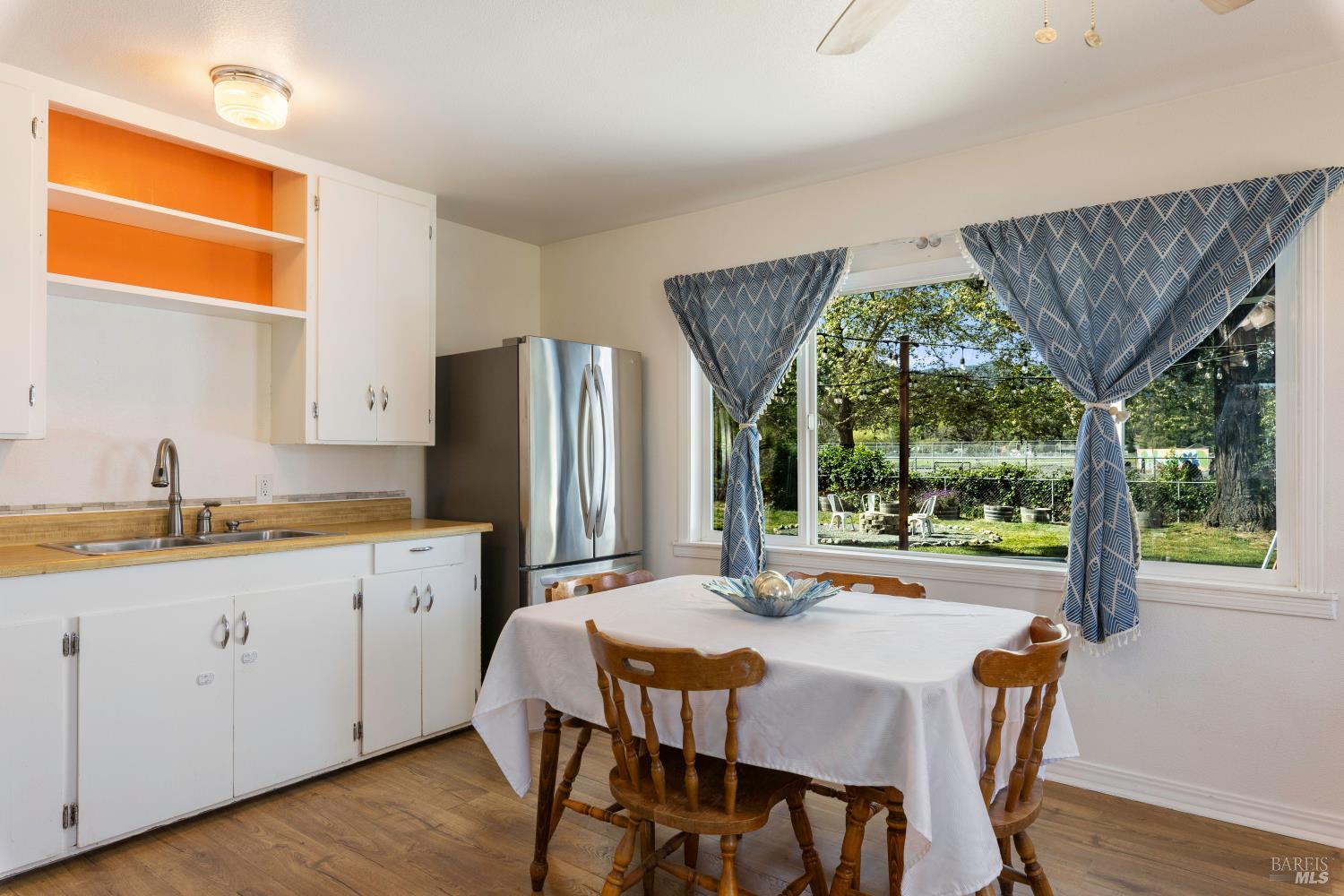 13780 Mountain House Road Hopland, CA 95449 - Photo 7 of 34 a dining room with stainless steel appliances granite countertop a dining table and chairs
