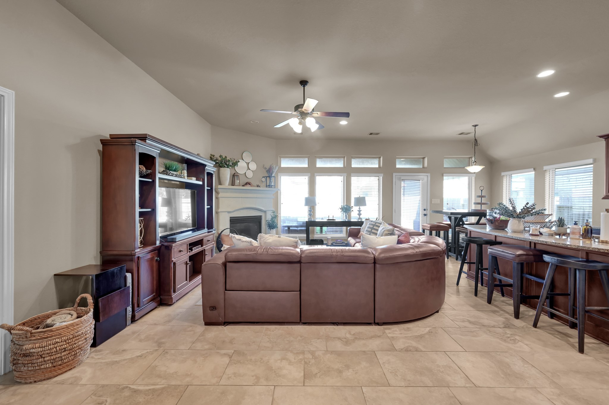 3814 Trophy Ridge Spring, TX 77386 - Photo 39 of 39 a living room with furniture a flat screen tv and kitchen view