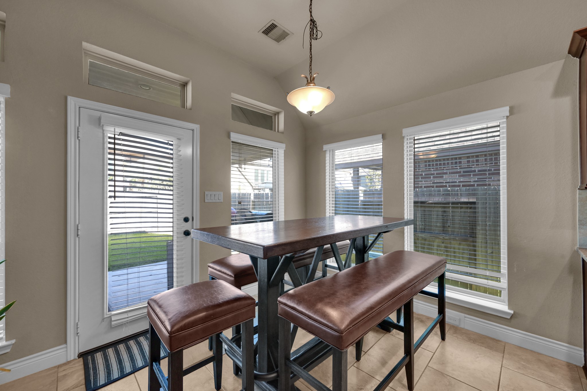 3814 Trophy Ridge Spring, TX 77386 - Photo 21 of 39 a view of a dining room with furniture window and wooden floor