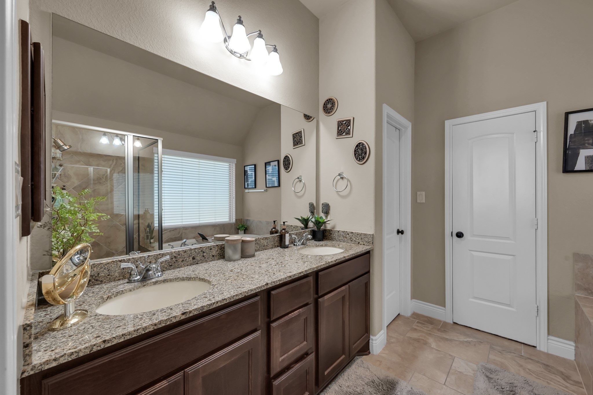 3814 Trophy Ridge Spring, TX 77386 - Photo 26 of 39 a bathroom with a granite countertop double vanity sink and a mirror