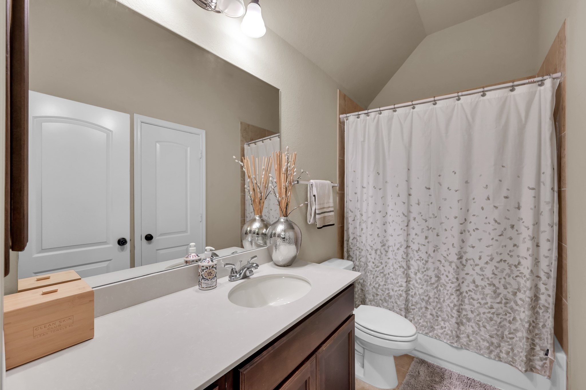 3814 Trophy Ridge Spring, TX 77386 - Photo 31 of 39 a bathroom with a double vanity sink toilet and a mirror