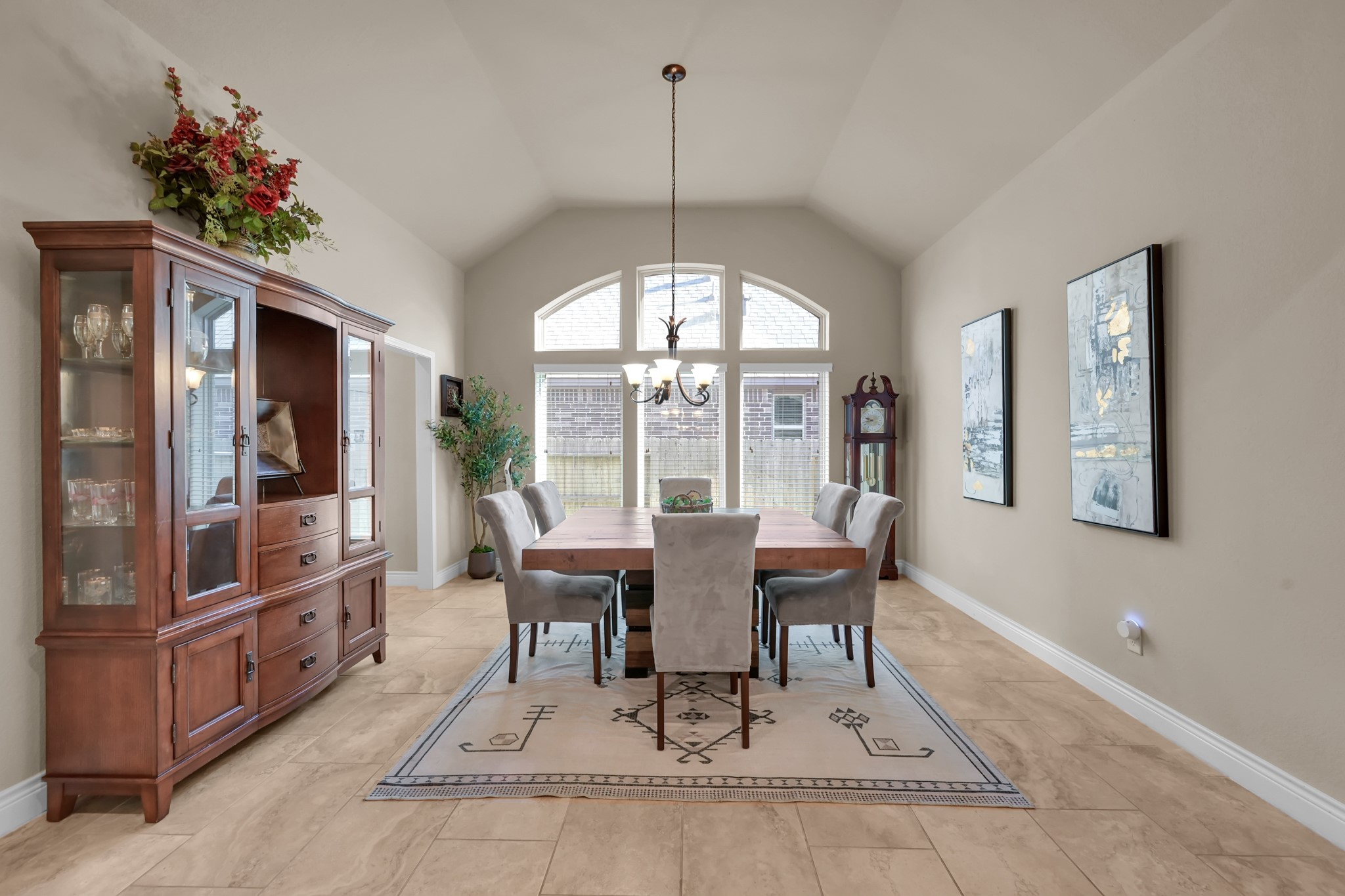 3814 Trophy Ridge Spring, TX 77386 - Photo 10 of 39 a dining room with furniture a chandelier and window