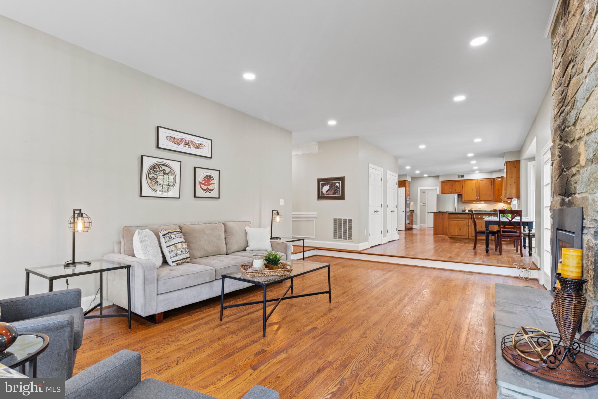 13601 Query Mill Road North Potomac, MD 20878 - Photo 21 of 69 Family Room Opening to Kitchen
