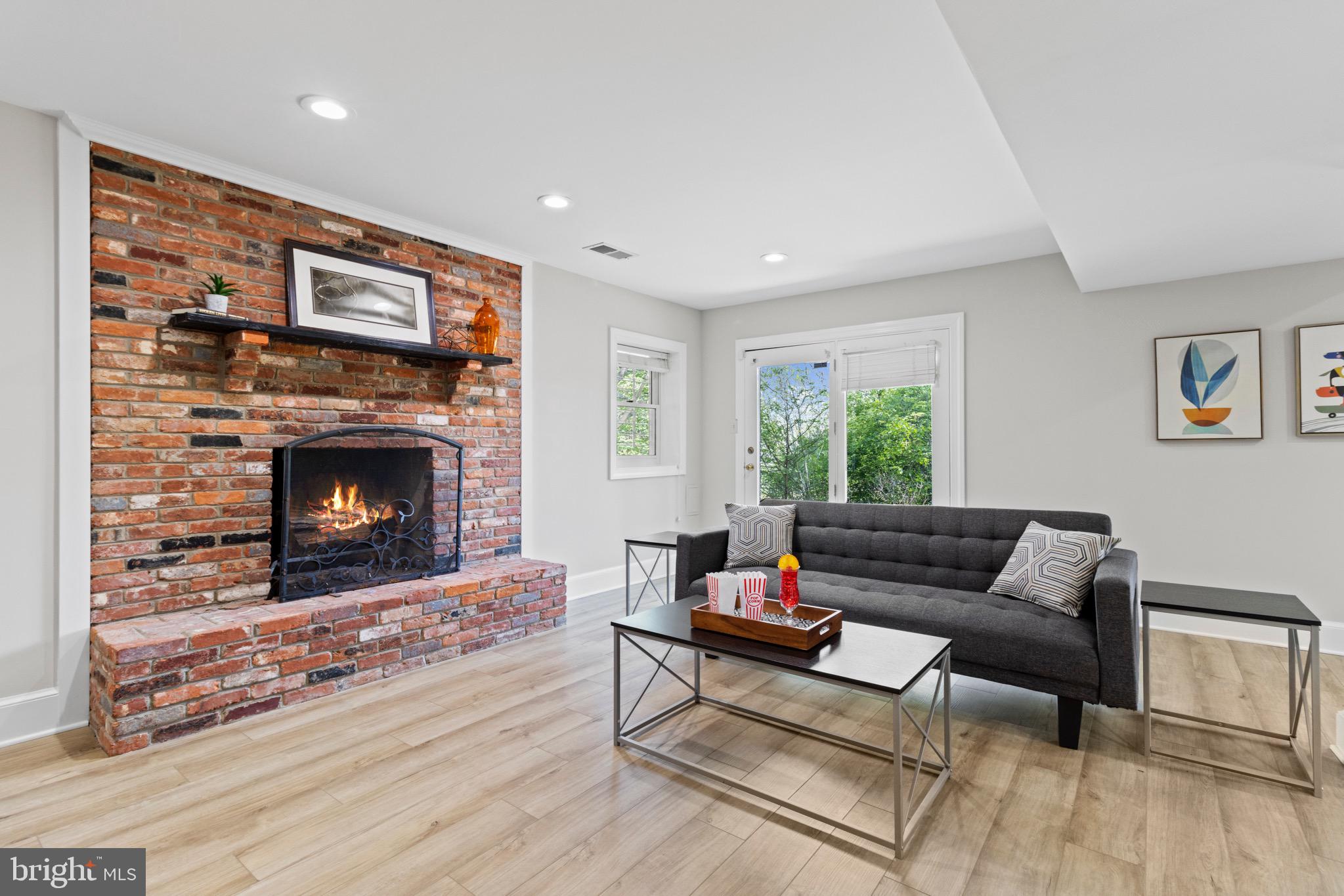 13601 Query Mill Road North Potomac, MD 20878 - Photo 46 of 69 Lower Level Rec Room w/ Wet Bar and Fireplace